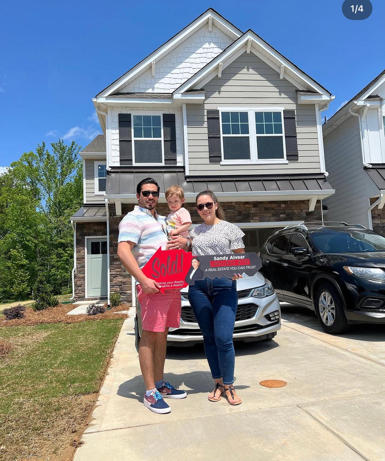 Young family with baby celebrating sold new construction home — Sandy Alvear